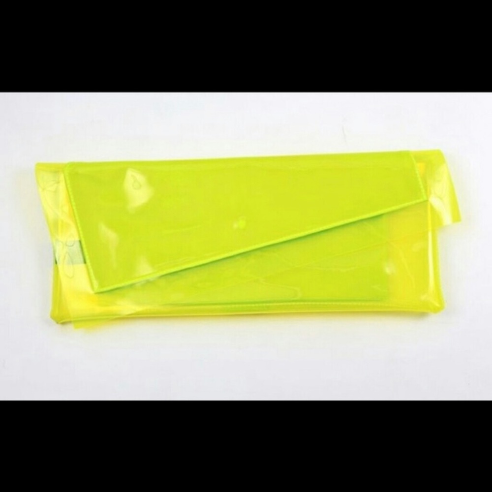 BCBG LEYNA ASYMMETRICAL CLUTCH BNWT LEMONGRASS